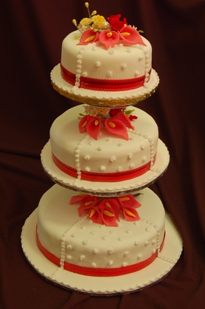 3Tier wedding cake for their wedding reception Theme color is red